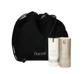 Black drawstring bag with 'Ourself' skincare products on a white background